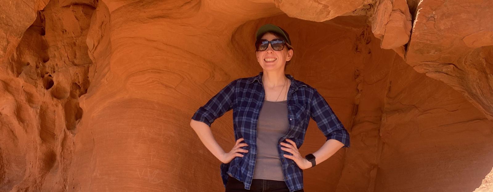 Crystal Crown standing in front of rock formation