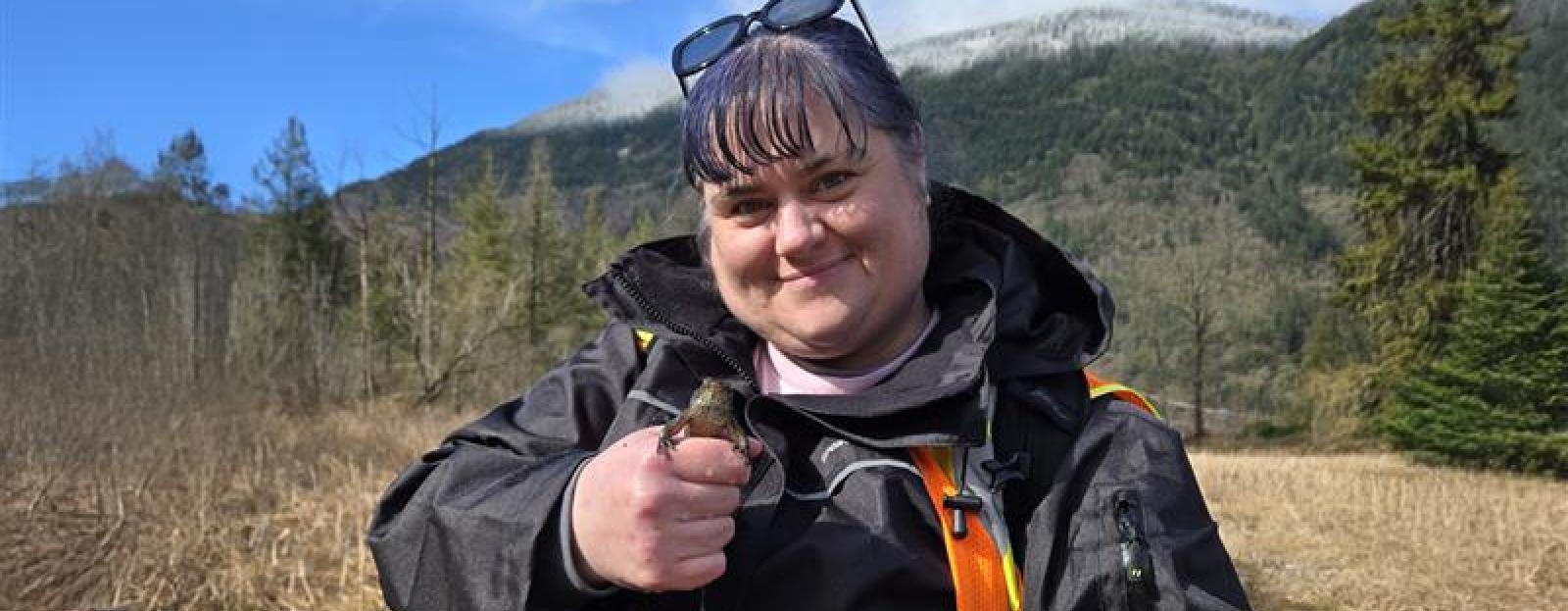 Jillian Stewart outside with mountains in background