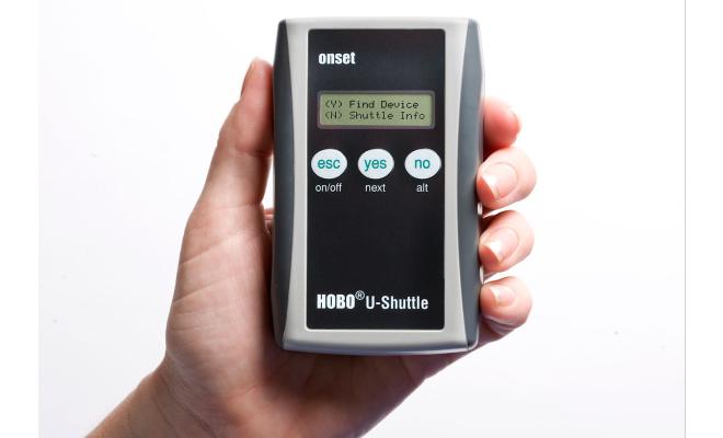Hand holding data downloading device to read out data from data logger