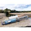 HOBO wireless data logger by water with 2 sensors attached and protective guards