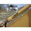 Tilt orientation meter installed on excavator in front of house