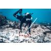 Scuba diver deploying a tilt meter data logger to measure current