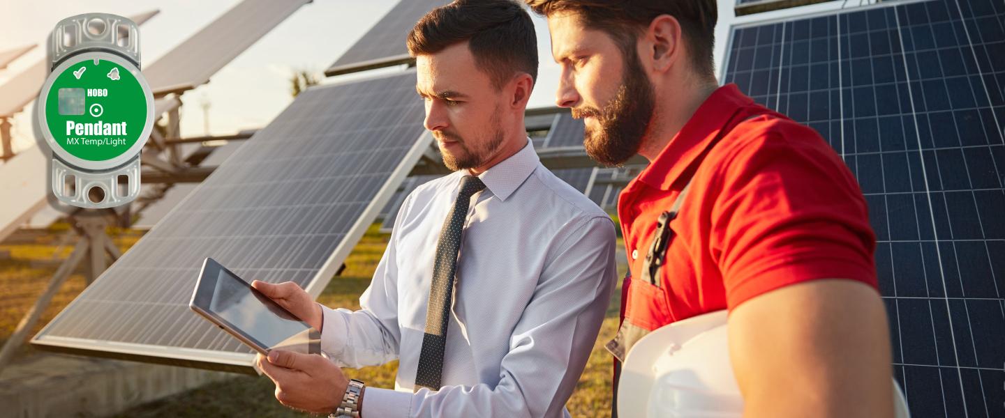 Users reviewing solar panel data on a tablet