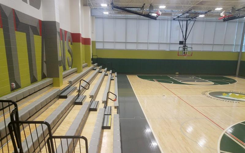 High school gymnasium showing hard wood floor 
